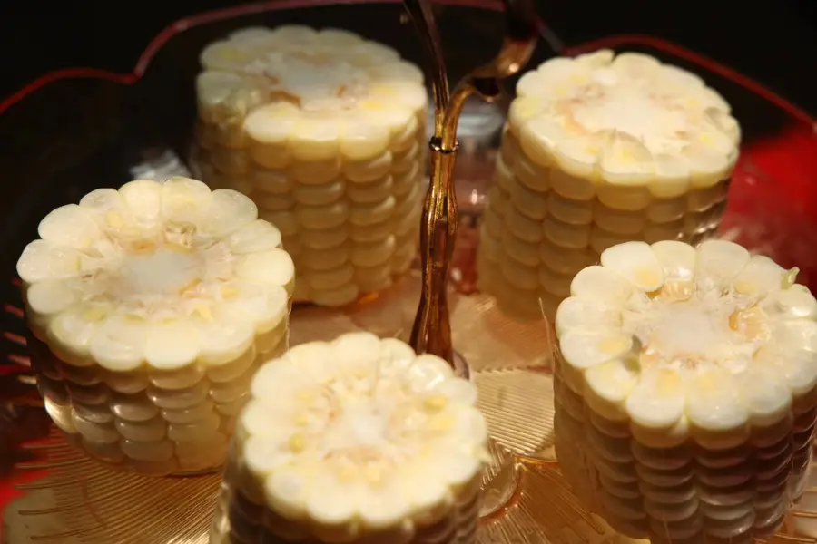 Sweet corn cobs cut into sections for quick-freezing